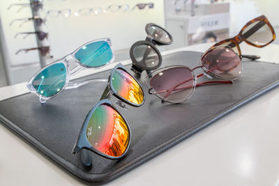 Close-up of sunglasses on table