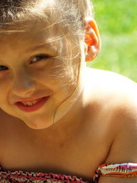 Close-up portrait of smiling girl