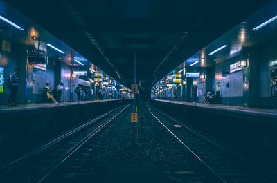 Railroad station platform at night