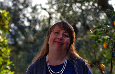 Portrait of a smiling young woman outdoors