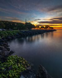 Scenic view of sea against sky during sunset