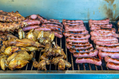 High angle view of meat on barbecue grill