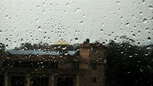 Houses seen through wet window