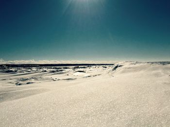 Scenic view of landscape against clear blue sky