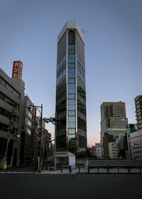 Low angle view of modern buildings against clear sky