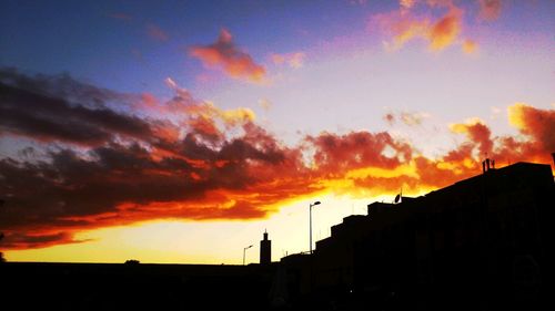 Low angle view of cloudy sky at sunset