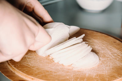 Close-up of person preparing food