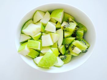 Close-up of fruit over white background