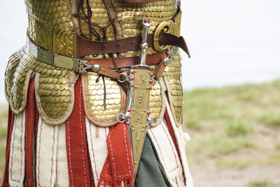 Close-up of metal hanging on field