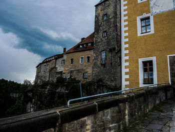 View of residential buildings against sky