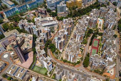 High angle view of street amidst buildings in city