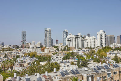 View of cityscape against clear sky