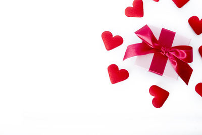 Close-up of christmas decorations over white background