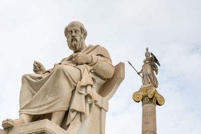 Low angle view of statue against sky