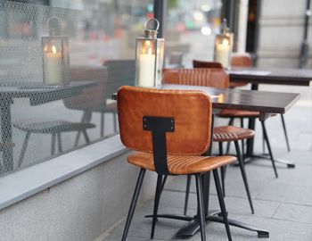 Empty chairs and table in restaurant