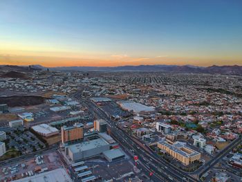 High angle view of townscape against sky during sunset