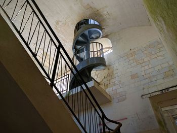 Low angle view of spiral steps and staircases in castle at port-des-barques