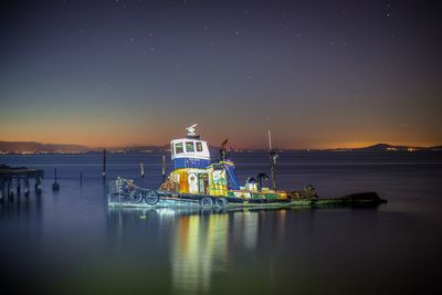 View of calm lake at night