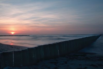 Scenic view of sea at sunset