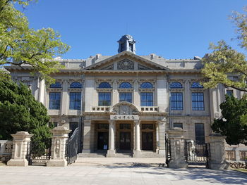 Facade of building against blue sky