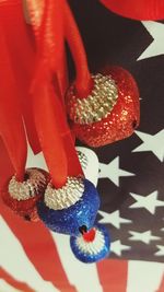 Low section of woman wearing red shoes