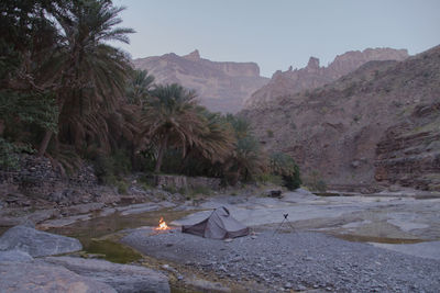 Scenic view of camping tent against canyon