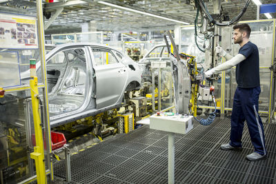 Man working in modern car factory