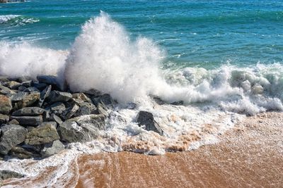 Waves splashing on shore