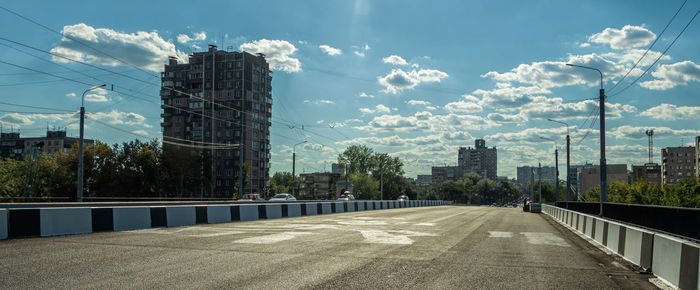 Buildings in city against sky