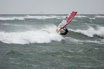 Man surfing in sea