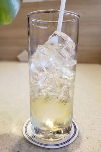 Close-up of ice glass on table