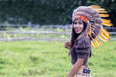 Woman in tribal dress and nature