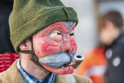 Carnival in carnia. sauris, masks of the religious and pagan tradition. italy