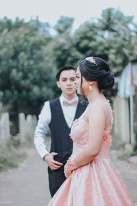 Couple standing outdoors