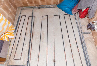 High angle view of umbrella on wooden table