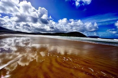 Scenic view of beach against sky