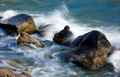 Scenic view of rocks in sea