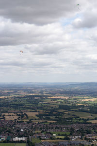 Aerial view of city against sky