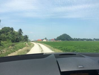 Country road passing through landscape