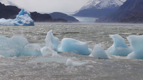 Panoramic view of frozen lake against mountain