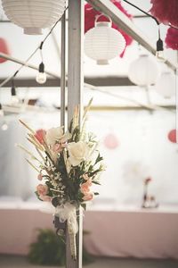 Close-up of white flower vase on table