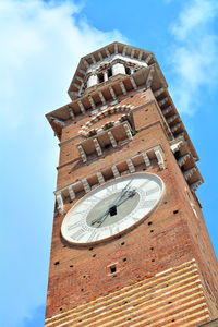 Low angle view of clock tower against sky