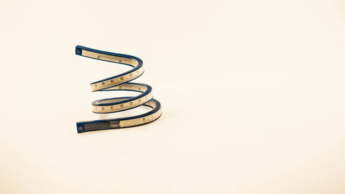 High angle view of metallic structure against white background