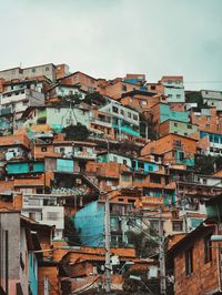 High angle view of residential buildings against sky