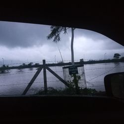 Bridge over sea against sky