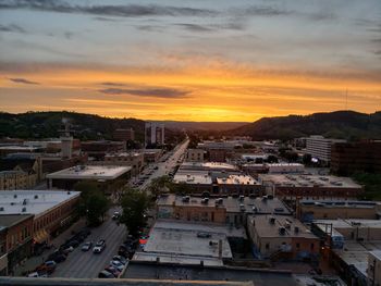 High angle view of townscape against sky during sunset