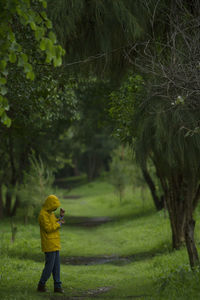 Rear view of man standing on land