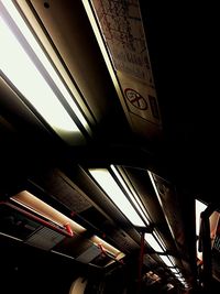 Low angle view of illuminated ceiling