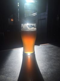 Close-up of beer in glass on table