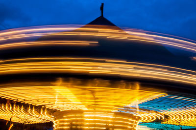 Close-up of abstract light against sky